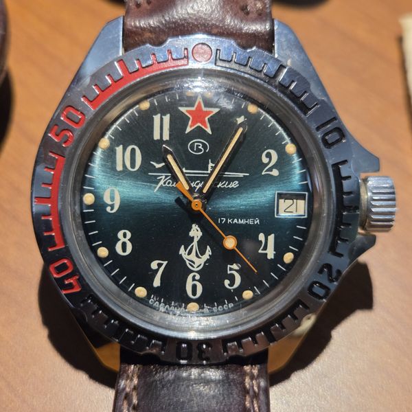 Vostok Komandirskie with leather case and papers