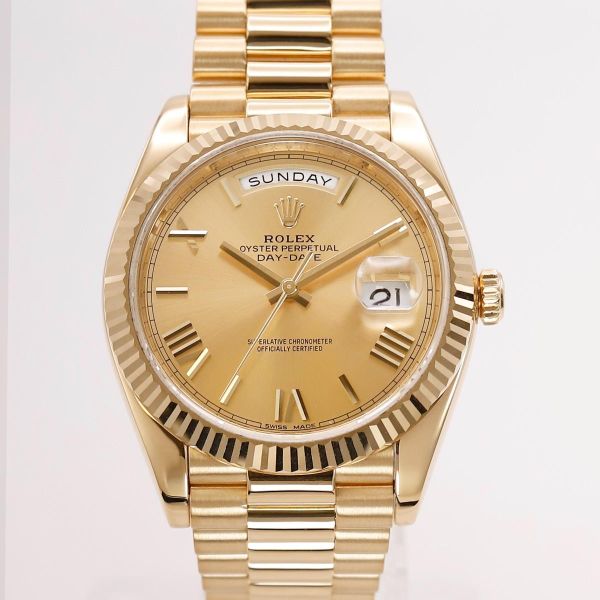 Rolex Day-Date 40 ref: 228238 18k Yellow Gold Champagne Dia…
