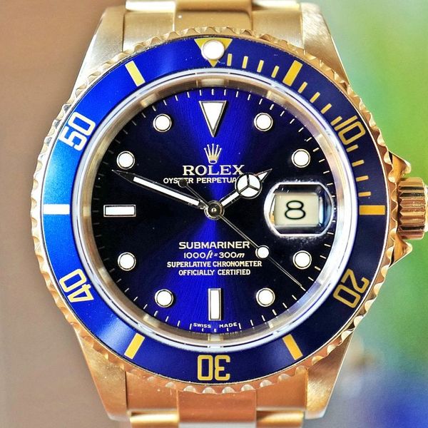 ROLEX SUBMARINER BLUE DIAL YELLOW GOLD OYSTER BRACELET 40mm…