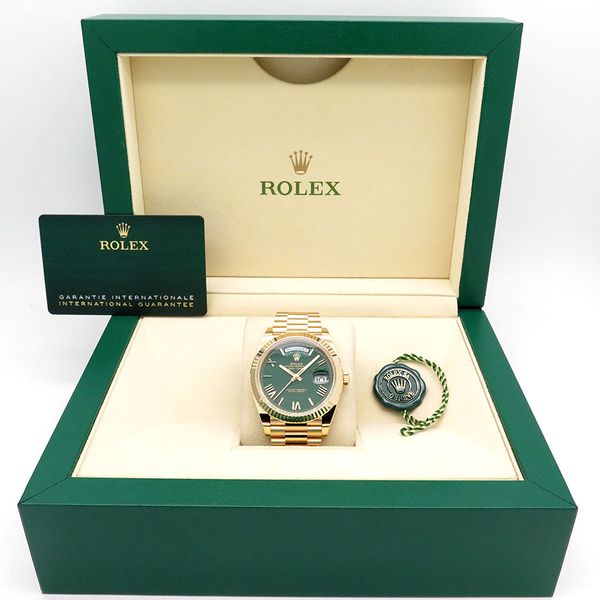 FS: NIB Rolex 228238 DAY DATE 40MM 18K YELLOW GOLD-GREEN RO…