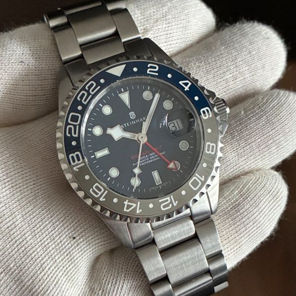 Steinhart 

Ocean One GMT BLUE-GREY Ceramic blue dial 42