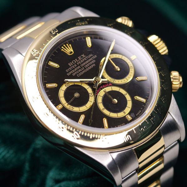 FSOT: Rolex Daytona Black Dial Two-Tone 18K Yellow Gold Sta…